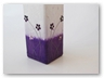 close up of medium square vase, purple with flowers