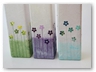 group photo of green, purple and blue medium square vases